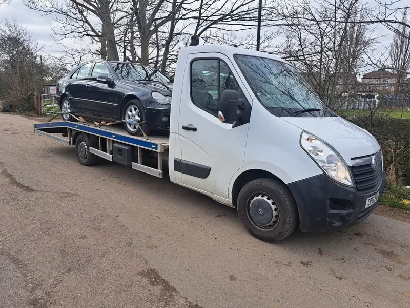 Scrap car bought and loaded onto a recovery truck in Darlington