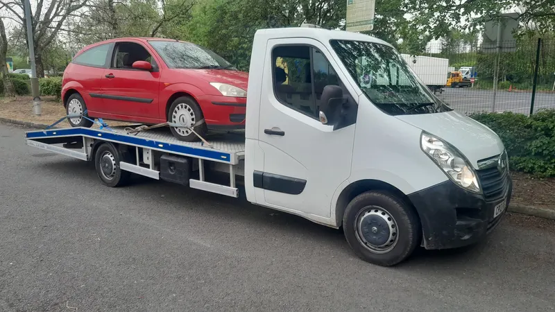 Car on a recovery truck bought for scrap in Darlington